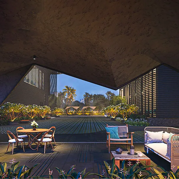 The Twins by DSR, Puppalaguda, artistic impression A terrace lounge with sofas and dining tables at The Twins by DSR, at night